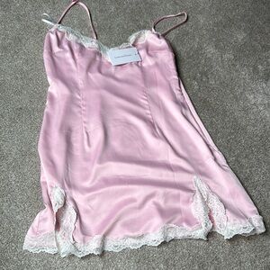 REVOLVE Lovers + Friends Pink and White Lace Chemise: Cassandra Slip in Pink.
